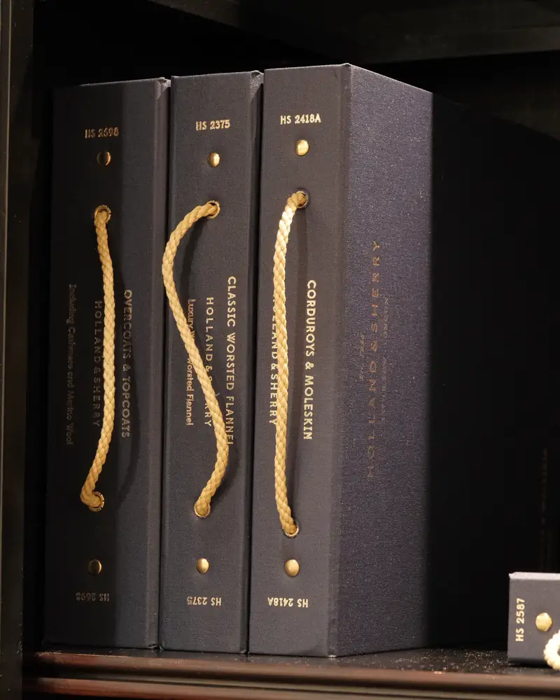 Holland & Sherry cloth books on the shelf at 528 Chapel Street
