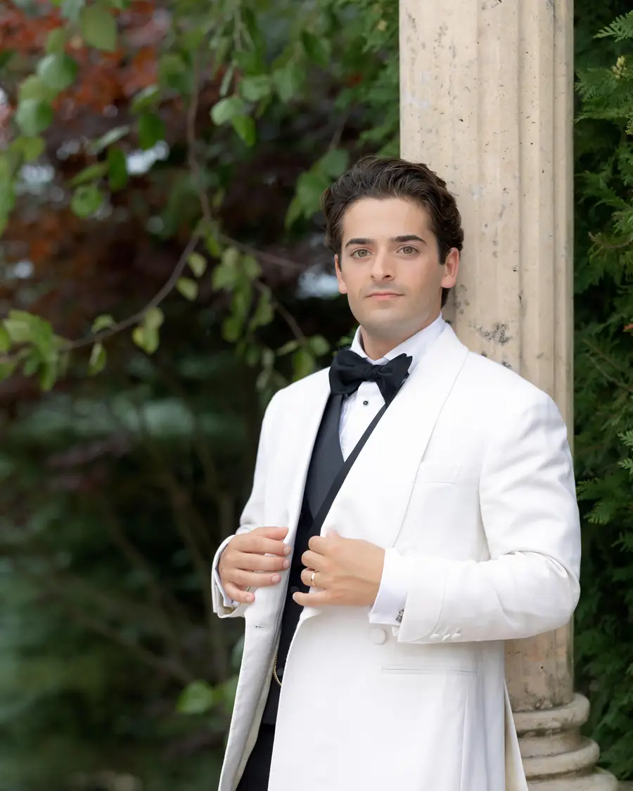 Mark Grasso in a white dinner jacket and black tie